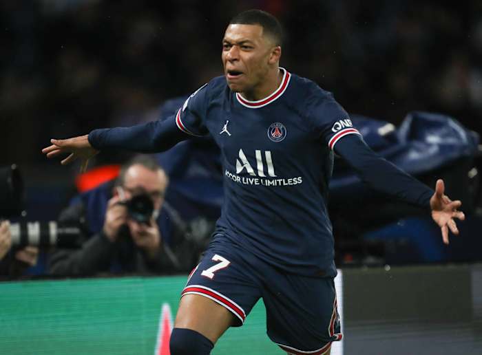 Kylian Mbappe celebrates scoring for PSG against Real Madrid in February 2022